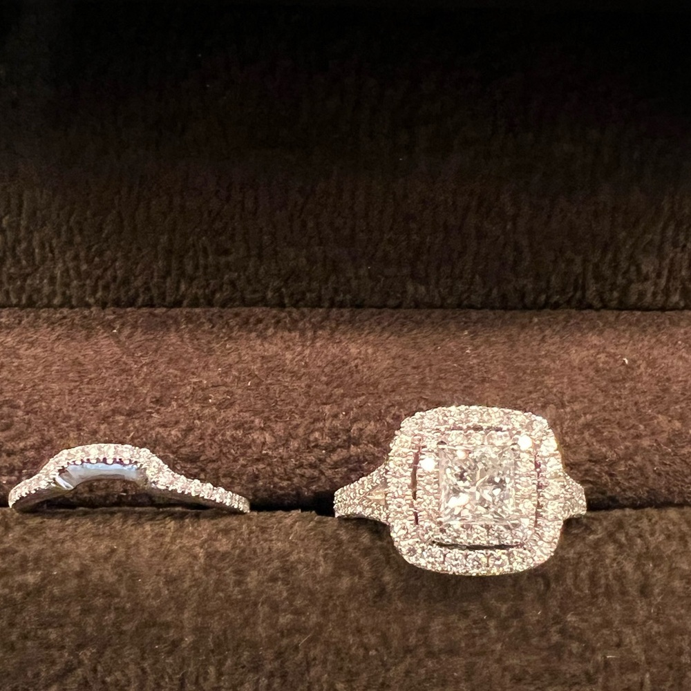White gold halo setting with princess cut center diamond.